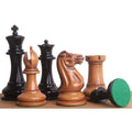 Detailed view of handcrafted 1849 Staunton chess pieces in distressed antiqued boxwood and ebony.