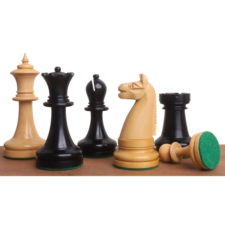 Ebony and boxwood 1900s American Chess Co. reproduction pieces with green felted bases.