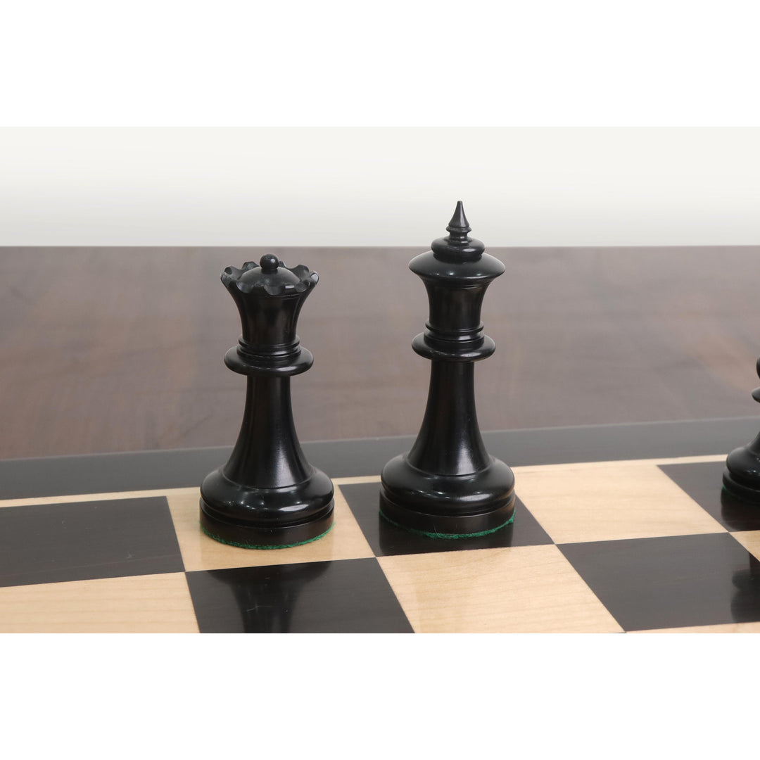 Ebony King and Queen from the 1900s' American Chess Company reproduction set on a board.