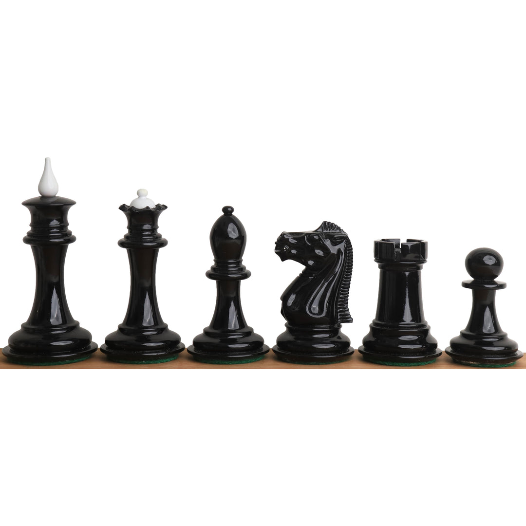 Full side profile of black lacquer boxwood chess pieces with contrasting white finials from the Soviet set.