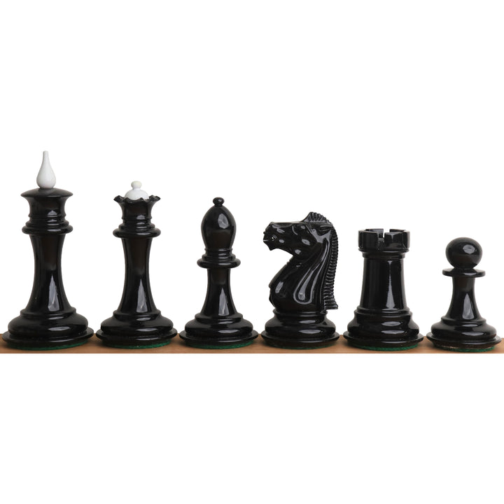 Full side profile of black lacquer boxwood chess pieces with contrasting white finials from the Soviet set.