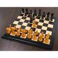 Full 1950s Fischer Dubrovnik chess set displayed on a premium black and maple wooden chessboard.