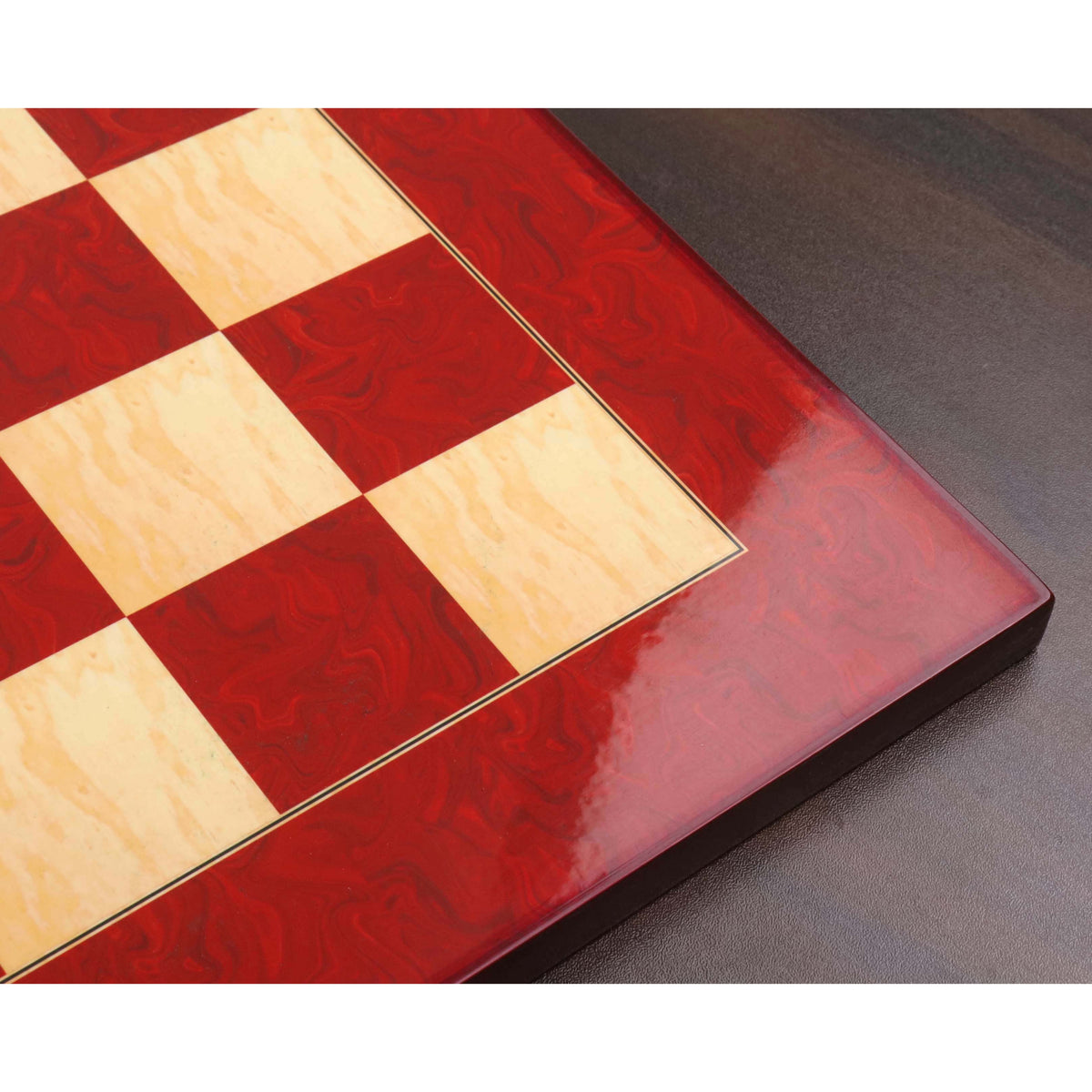 Close-up showing the high gloss finish and reflective surface of the Red Ash Burl printed chess board.