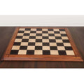 25 inch Players Choice ebony and maple wood chess board with 65 mm squares and matte finish.