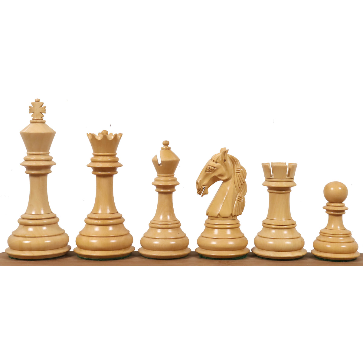 Set of 4.6-inch Columbian Staunton boxwood chess pieces standing in a line.