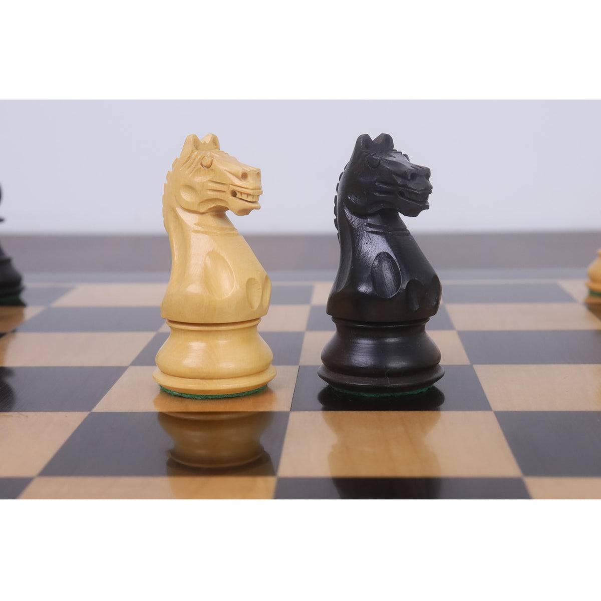 Black and white Fierce Knight chess knights on a board.