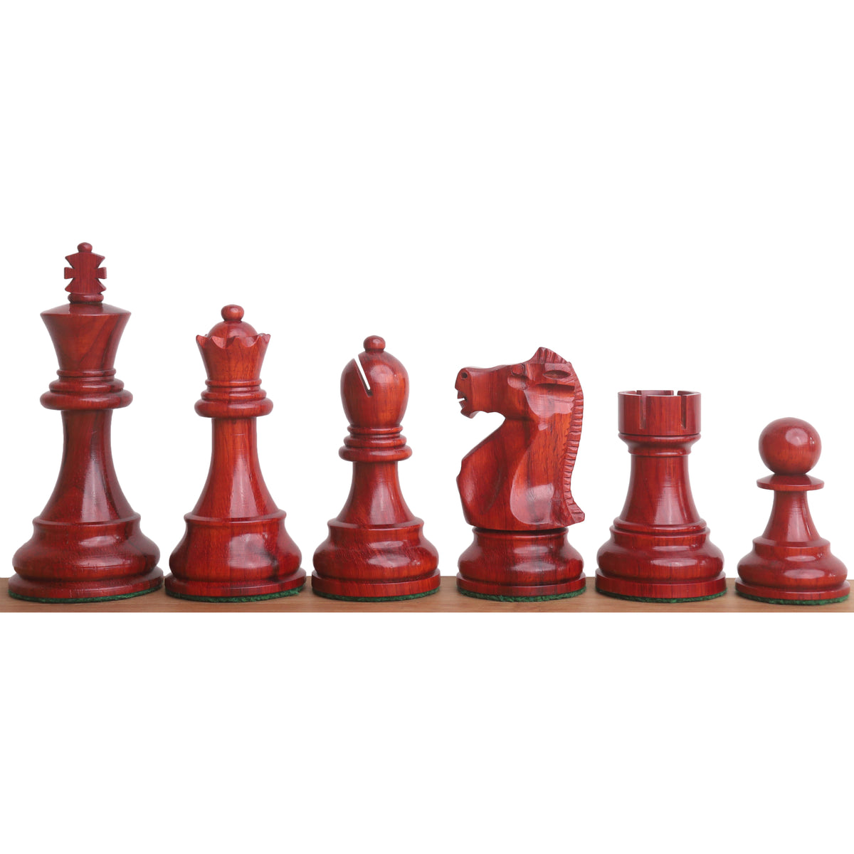 A complete lineup of the 1972 Fischer Spassky chess pieces in deep Bud Rosewood from King to Pawn.
