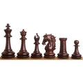 Dark Rosewood chess pieces from the 3.9" Heritage Series Staunton set lined up, featuring the King, Queen, Bishop, Knight, Rook, and Pawn.