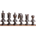 Metallic grey Victorian metal chess pieces lined up from King to Pawn.