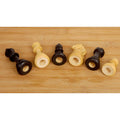 Hollow bases of ebonised and boxwood chess pieces compatible with Chessnut Air electronic boards.