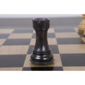 Black rook from the Fierce Knight Staunton chess set.