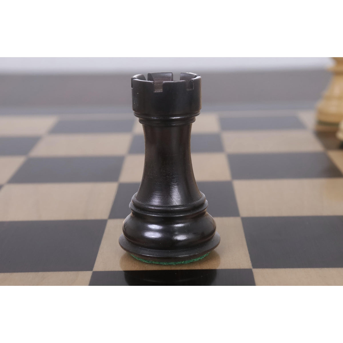Black rook from the Fierce Knight Staunton chess set.