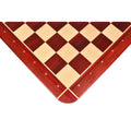 Close-up corner view of a 23" Bud Rosewood and Maple chessboard showing white algebraic notations A-F and 4-8.