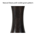 Macro detail of the premium natural ebony wood grain on a Prestige Luxury Staunton chess piece.