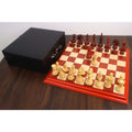 Full 4.5-inch Carvers' Art luxury chess set arranged on a budrose and maple wood board.
