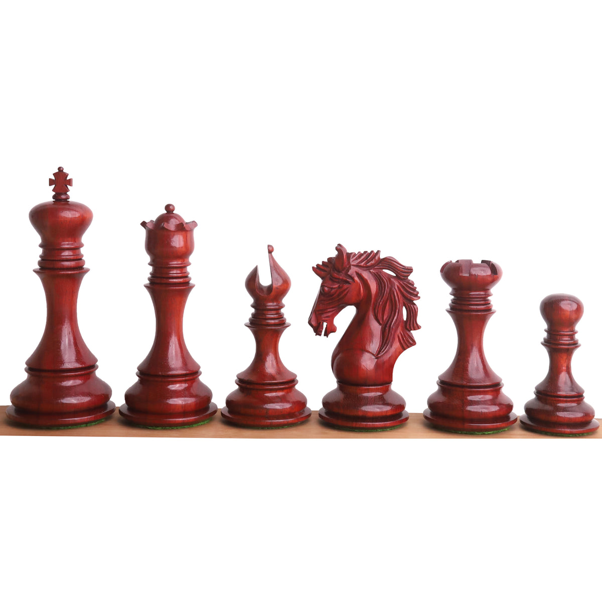 Lineup of Bud Rosewood Goliath series Staunton chess pieces.