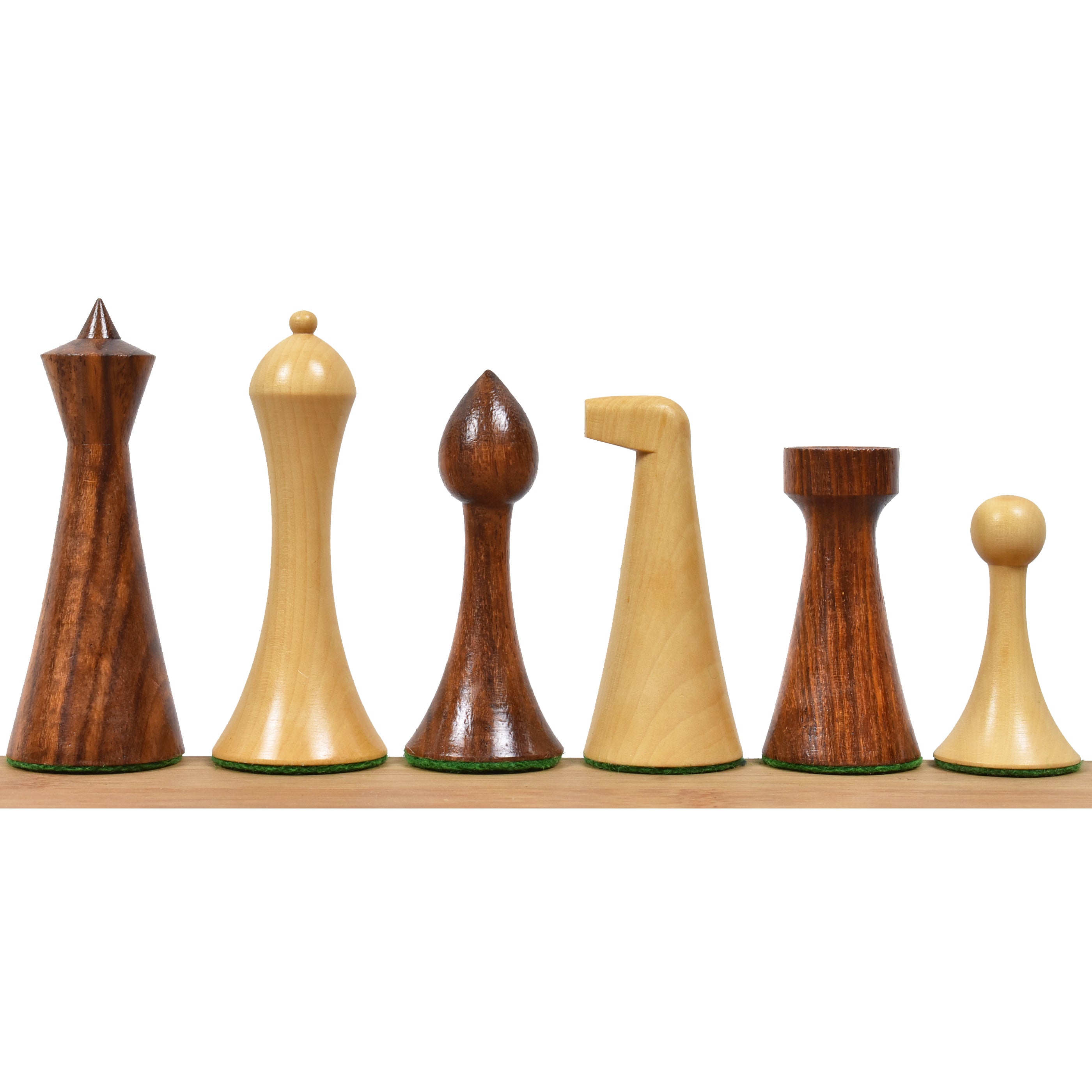 Close-up of light boxwood Herman Ohme chess pieces including King, Queen, and Bishop.