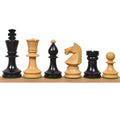 Romanian Hungarian style ebonised and natural boxwood chess pieces lined up from King to Pawn.