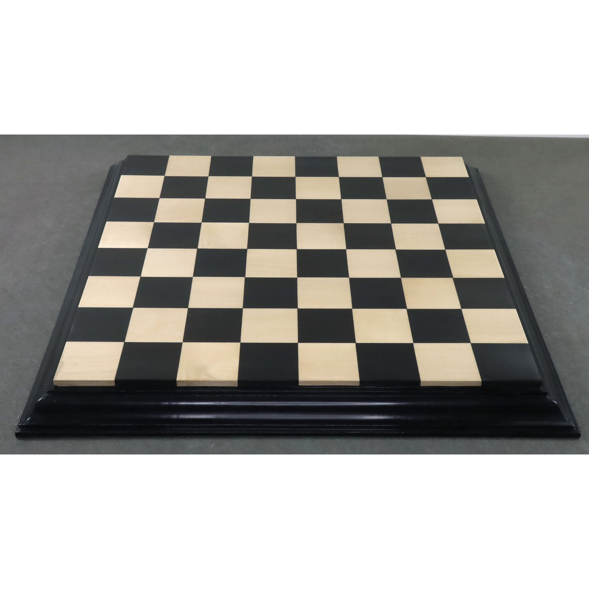 Premium ebony wood chessboard for luxury chess sets.