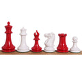 Complete lineup of red and white 3.75-inch 1849 Jacques Cook Staunton chess pieces on display.
