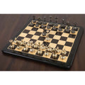 3.7" Splendor Series brass metal luxury chess set in gold and metallic grey, arranged for play on a wooden chessboard.