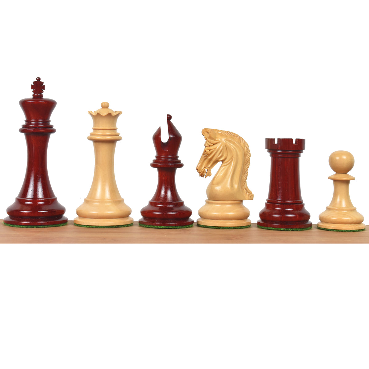 Repro 2016 Sinquefield Staunton chess pieces lineup in bud rosewood and boxwood.