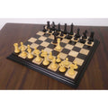 Full setup of 4.5 inch Incitatus luxury Staunton chess pieces arranged on a premium wooden chessboard.