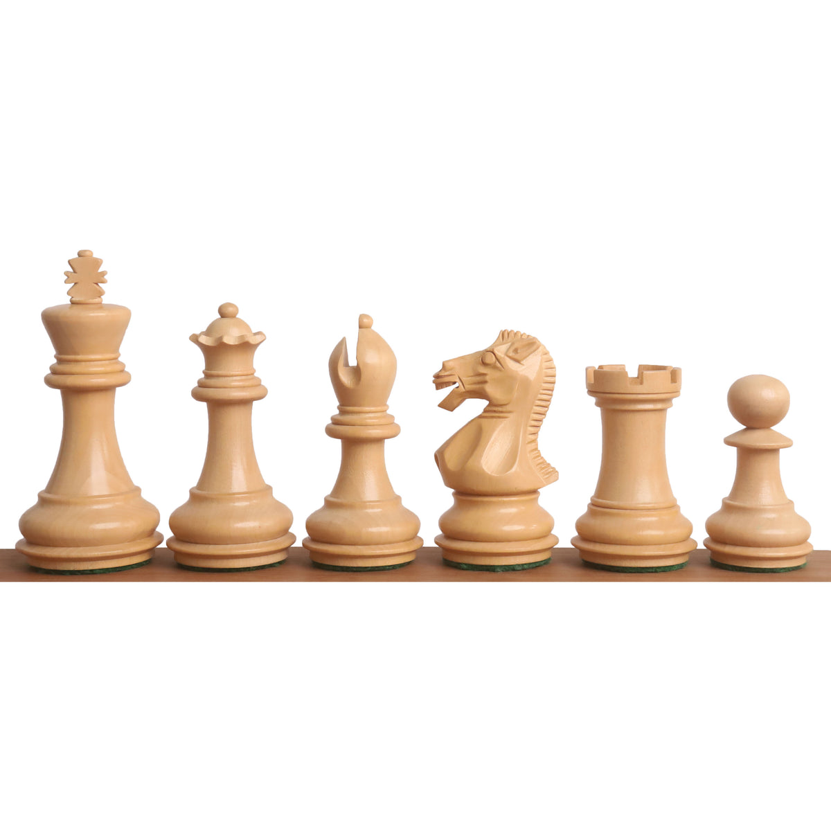 Hand-carved boxwood Staunton chess pieces with 3.1 inch king and weighted chamfered bases.