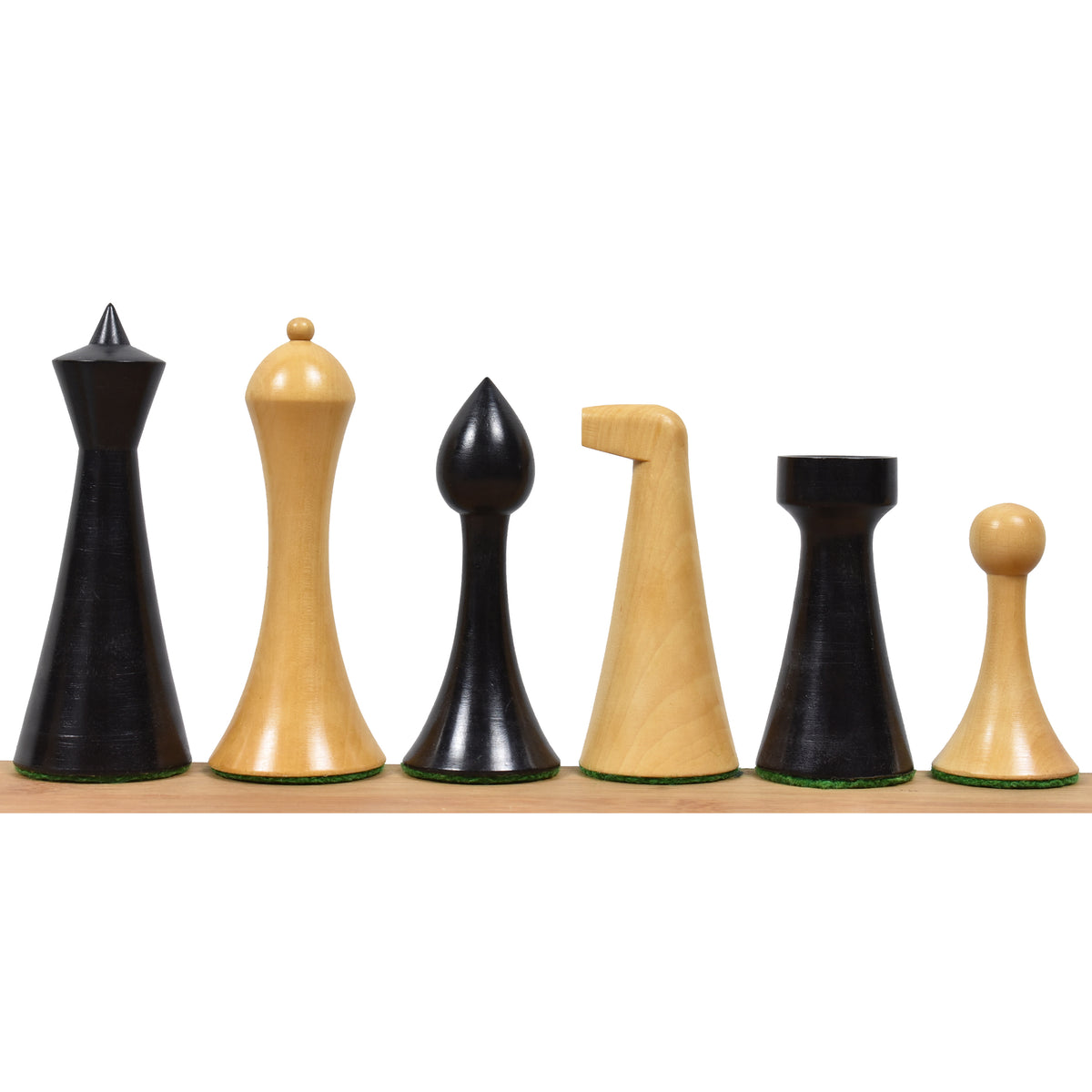 Side view of Herman Ohme chess pieces including king, queen, bishop, knight, rook, and pawn in ebonised boxwood.