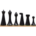 Ebonised boxwood Herman Ohme chess pieces including king, queen, bishop, knight, rook, and pawn.