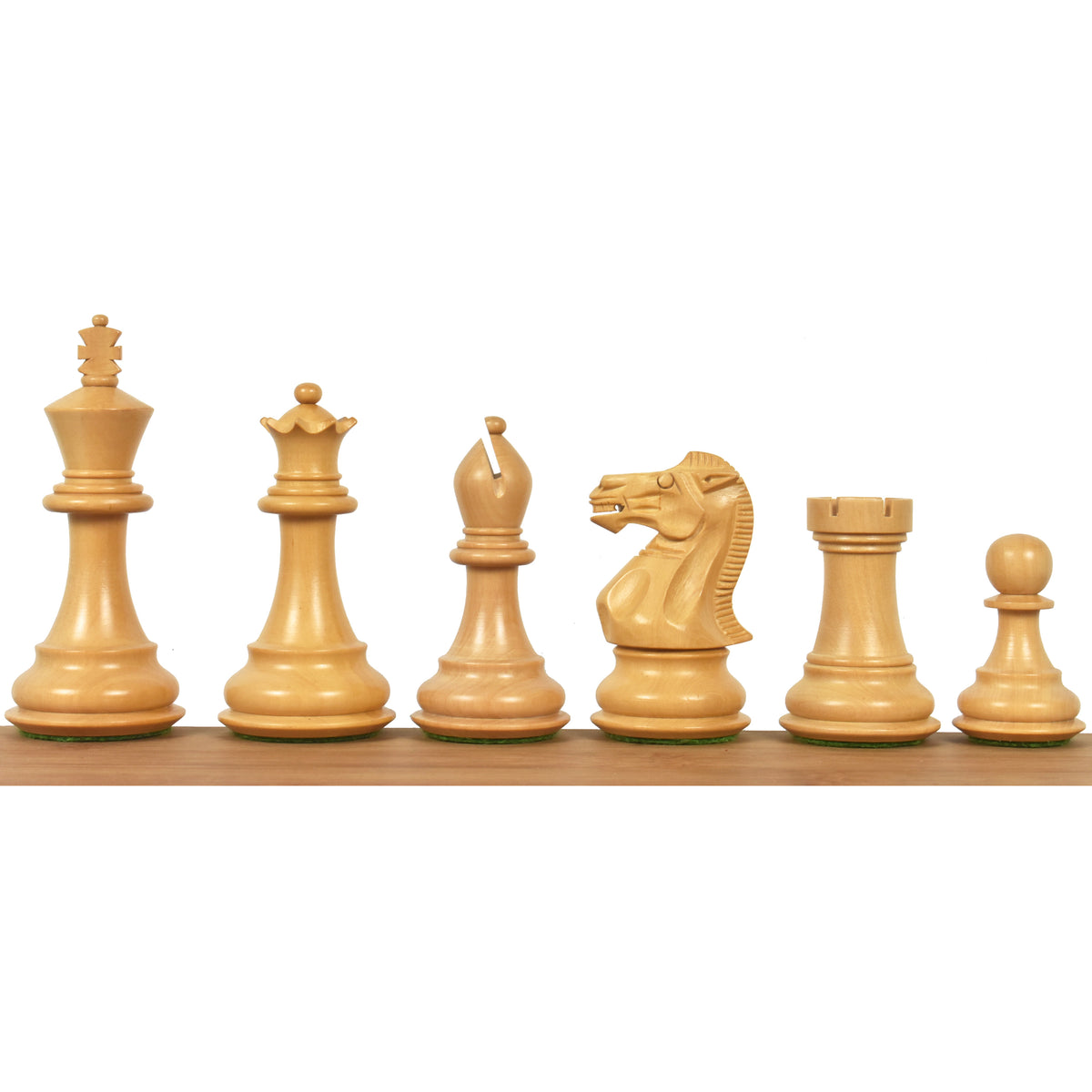 A lineup of 3.6" Boxwood Staunton chess pieces showing King to Pawn.
