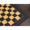 Detailed view of the decorative inlaid border on the Queens Gambit ebony and maple chess board.