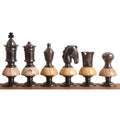 Lineup of metallic grey Victorian Fusion brass metal chess pieces from King to Pawn, featuring light wooden bases.