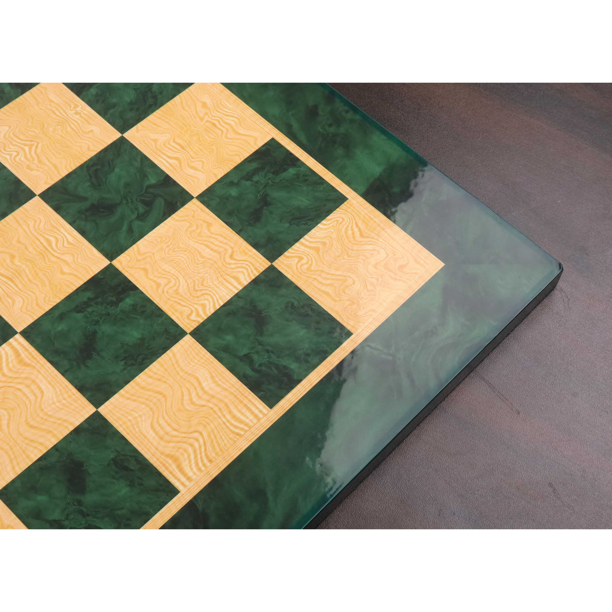 Corner view of a 22-inch luxury green ash burl wooden chess board.
