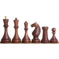 Detailed view of the dark Golden Rosewood Soviet chess pieces.