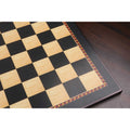 Detailed view of the matte finish and intricate geometric border of the Queen's Gambit printed wood chess board.