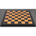 High-quality wooden chessboard ready for play, featuring a clean finish.