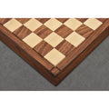 Raised border edge and grooved corner lines of a hand-crafted golden rosewood chess board.