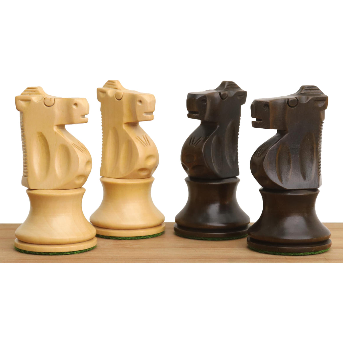 Detailed view of carved knight pieces from the French Lardy set.