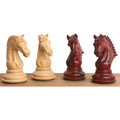 Detailed view of four hand-carved Bud Rosewood and Boxwood chess knights.