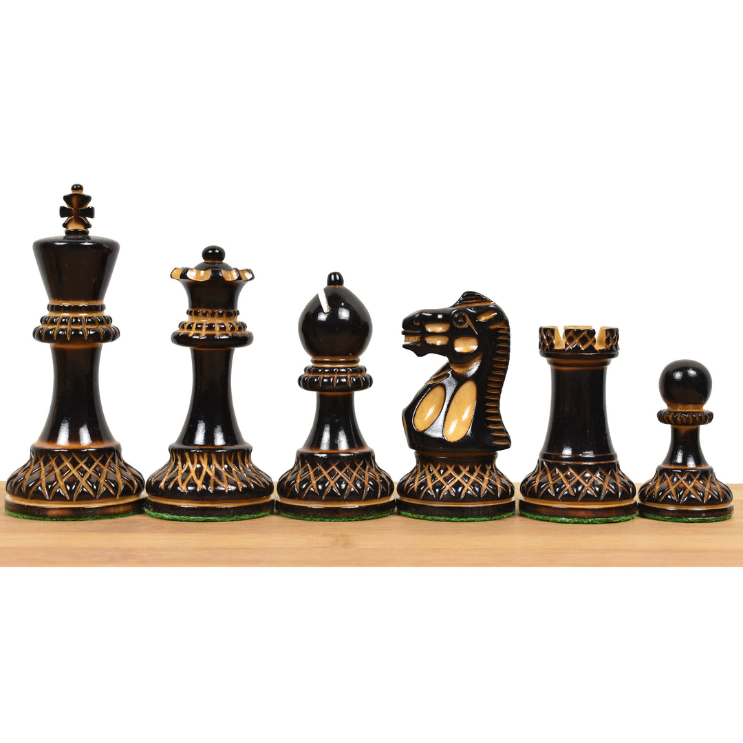 Intricately carved lacquered burnt boxwood and natural boxwood Parker Staunton chess pieces.