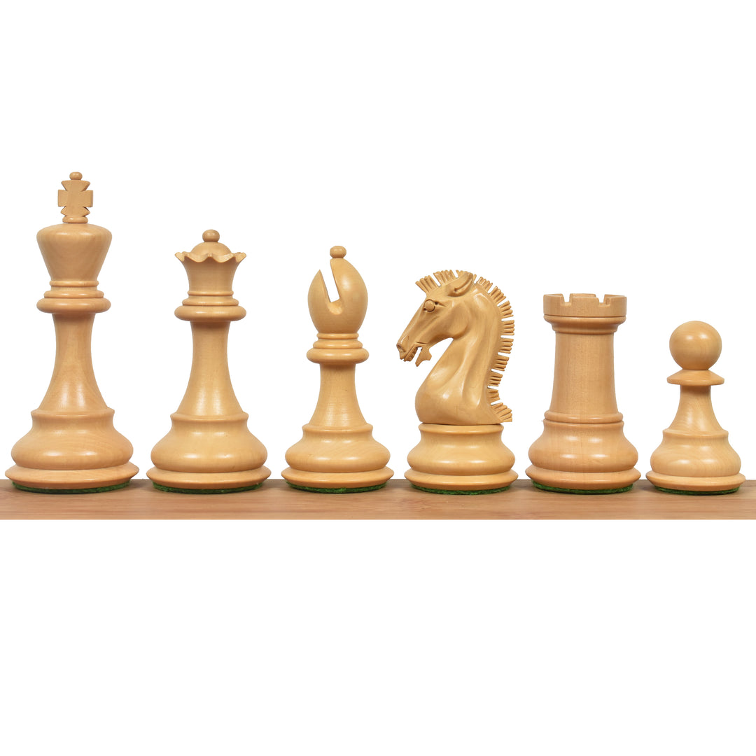 Natural boxwood light pieces of the 3.9" Craftsman Staunton chess set standing in descending order.