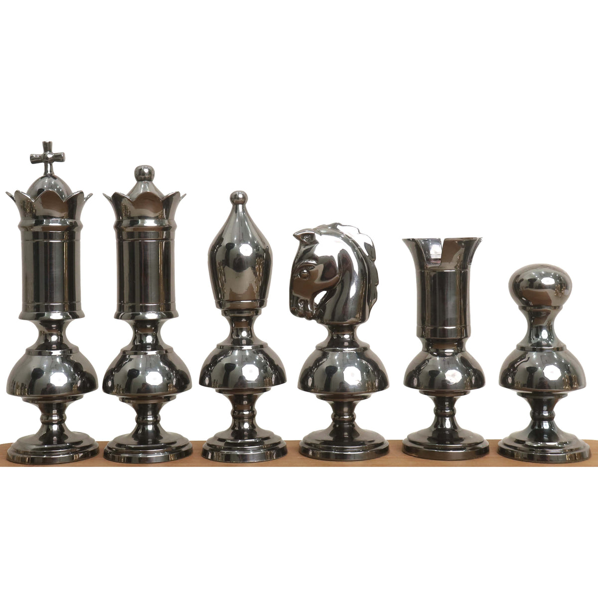 Grey variant of the giant Victorian series brass metal luxury chess pieces displayed in a structured row.