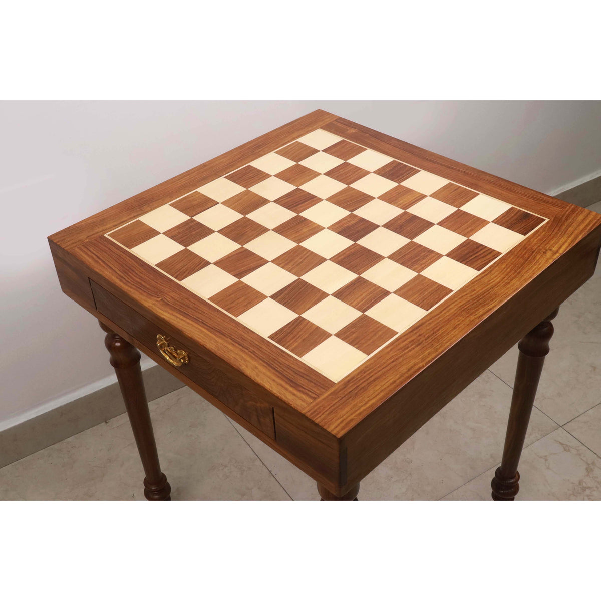 Close-up of the 23 inch chess tabletop surface made of inlaid golden rosewood and maple wood squares.