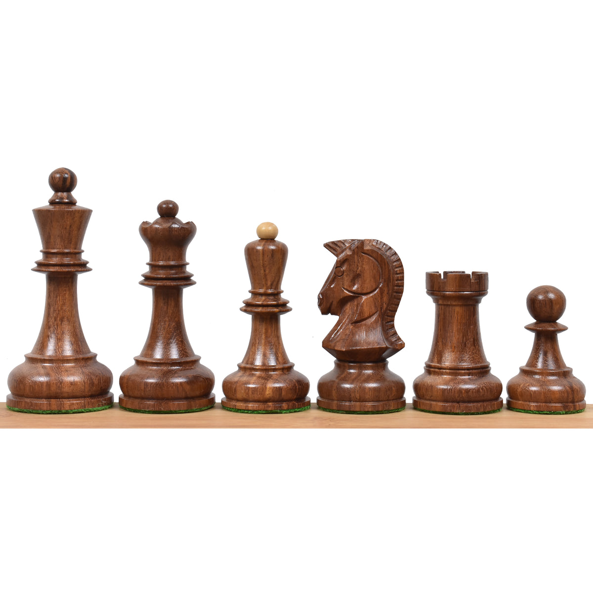 Full set of golden rosewood Dubrovnik chess pieces arranged in a row.