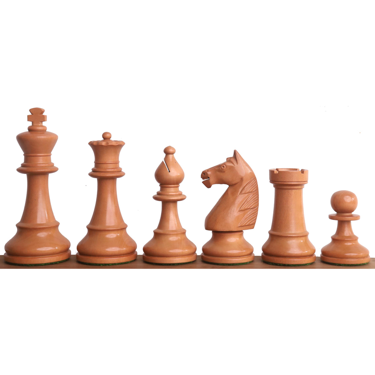 Complete lineup of antiqued boxwood 1950s Soviet Grandmaster chess pieces from king to pawn.