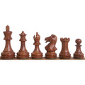 Weighted golden rosewood Staunton chess pieces showing natural wood grain and chamfered stems.