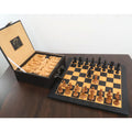 Complete 3.9" Lessing Staunton Chess Pieces set displayed on a wooden chessboard beside a premium padded storage box.