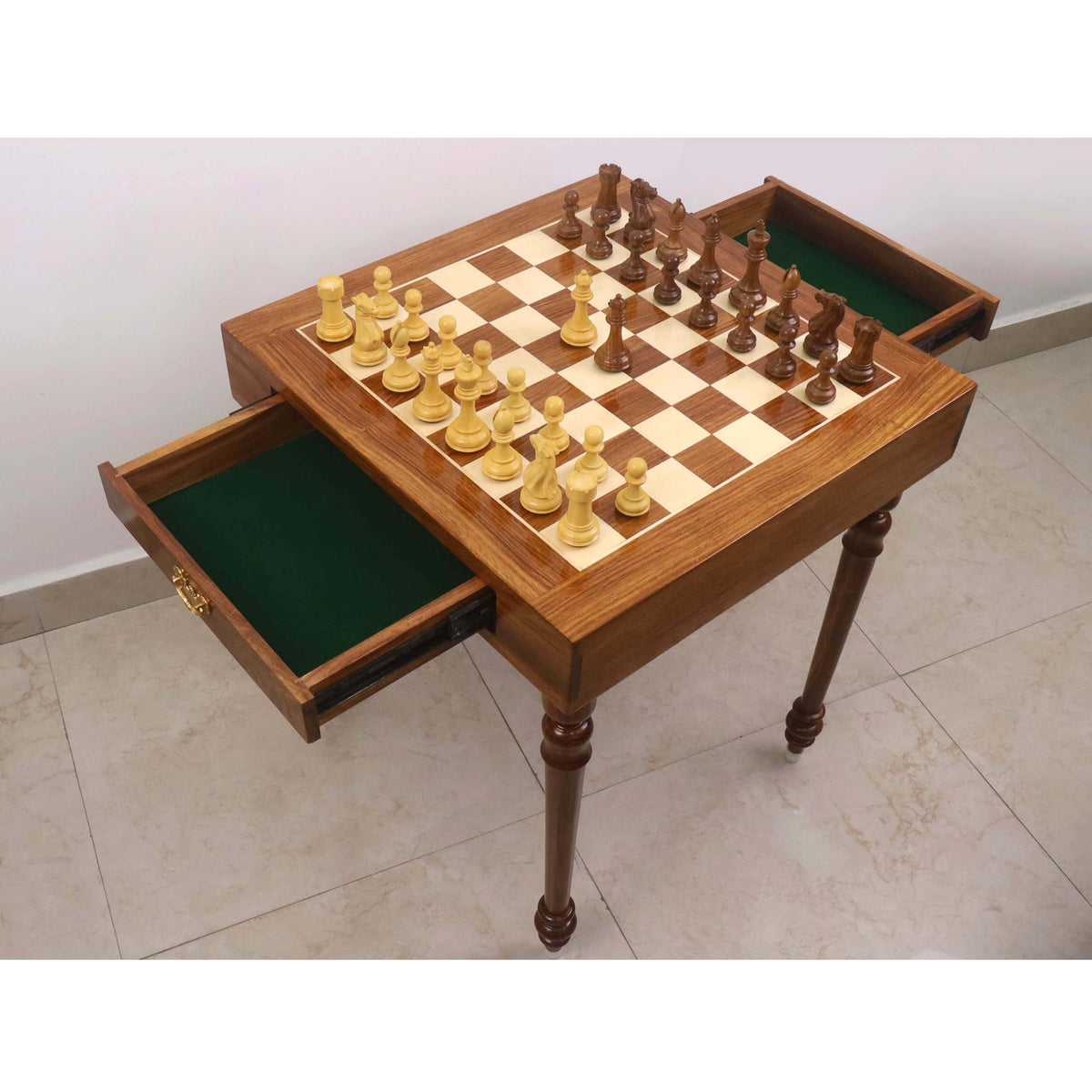 Perspective view of the 23-inch chess table with both storage drawers open, showcasing the Golden Rosewood and Boxwood chess set.