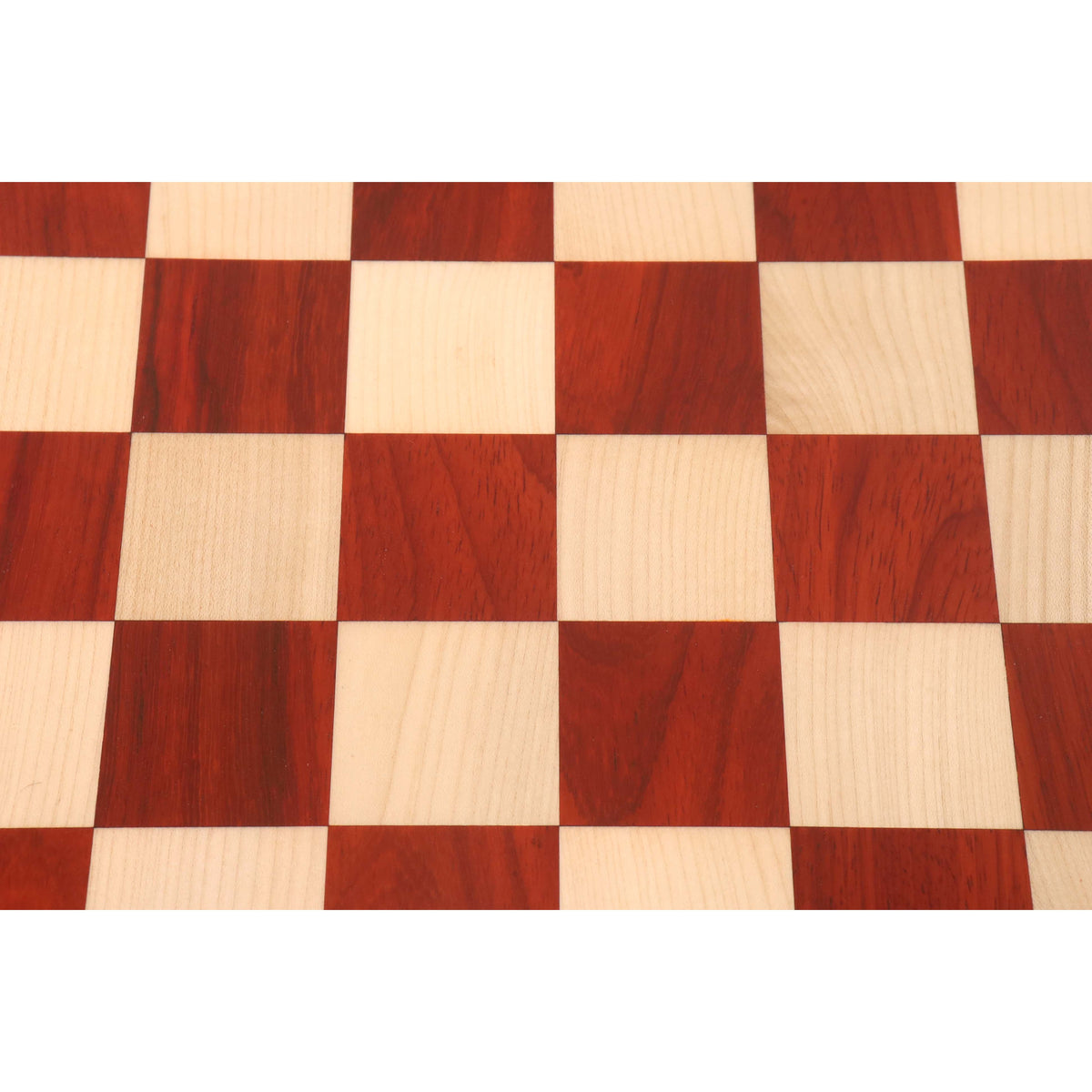 Detailed texture of bud rosewood and maple wood playing squares on a luxury chessboard.